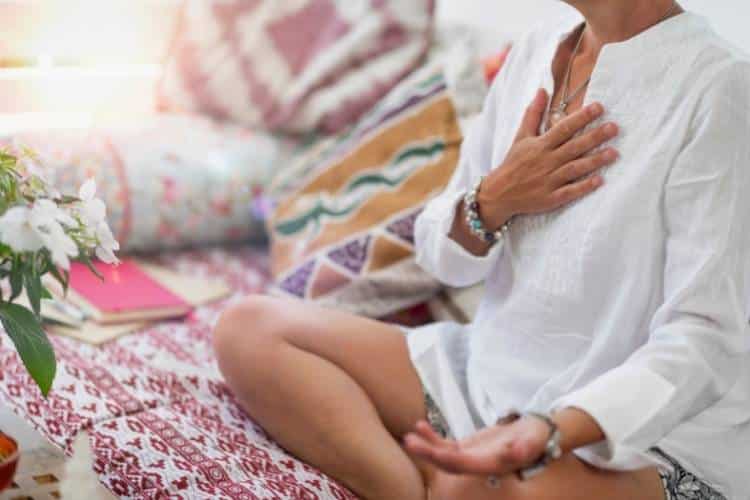 A person sitting and meditating